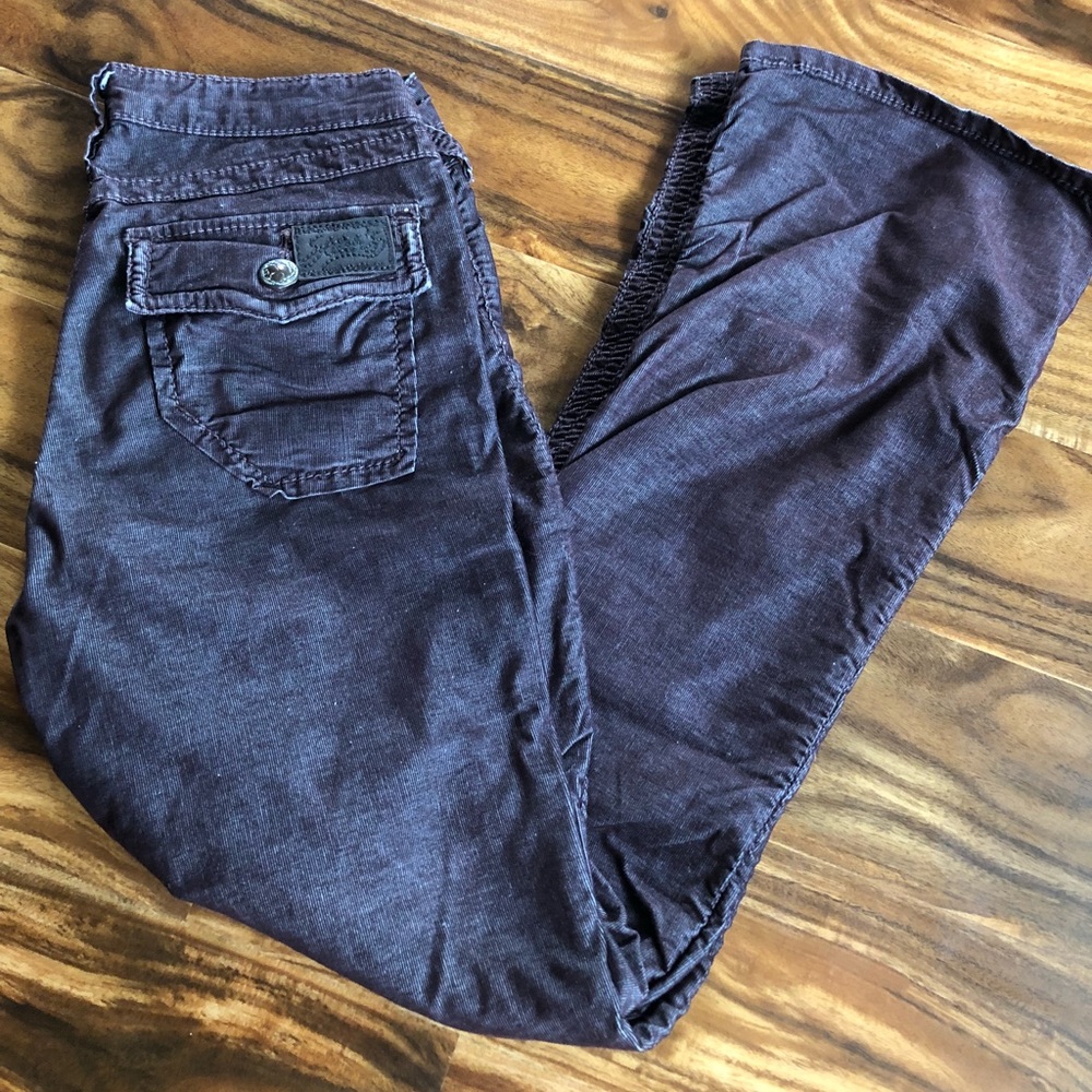 Stitch’s brown/ maroon corduroy pants.